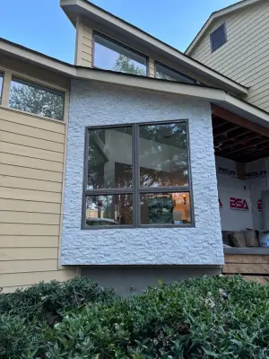 Contemporary Stone Facade by Gonzalez Construction Co