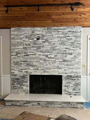 Rock-inspired hearth by Gonzalez Construction Co
