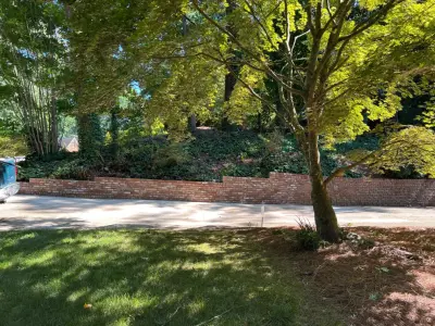 Brick Retaining Wall Restoration by Gonzalez Construction Co