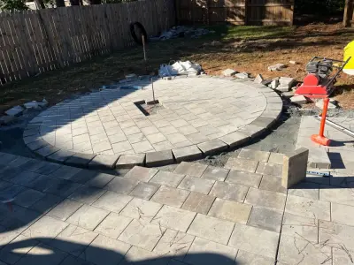 Sierra pavers installation along with firepit and seating wall — Stone & Concrete Installation project by Gonzalez Construction Co