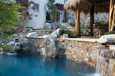 Tropical Retreat — Landscape Construction project by SURROUNDS Landscape Architecture + Construction in Potomac Falls