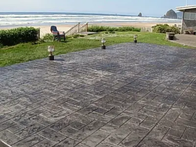 Griswald Beach House with Stamped Concrete Patio — Stone & Concrete Installation project by Clatsop Concrete