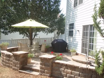 PATIOS, WALKWAYS, SITTING WALLS by Sutton Outdoor, LLC
