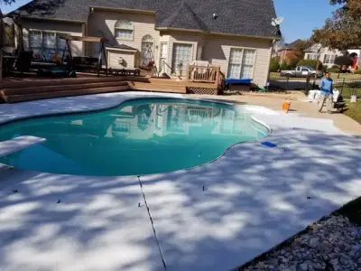Pool Surround with Concrete Overlay — Stone & Concrete Installation project by Unique Concrete Design LLP