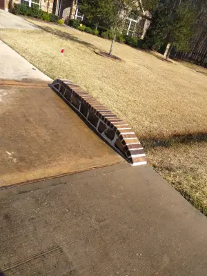 Driveway Drainage Repair by Brick Restoration
