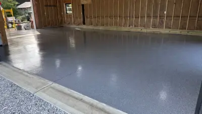 Garage Surface — Stone & Concrete Installation project by Decorative Concrete Resurfacing