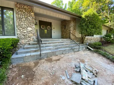 Courtyard and Barrier by Leo Paver LLC
