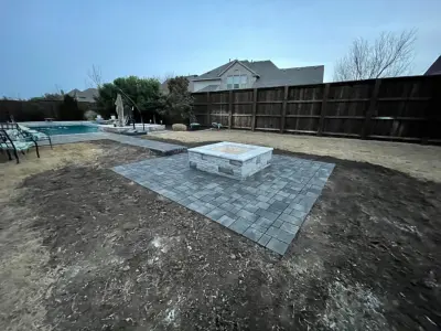 Outdoor fireplace building — Stone & Concrete Installation project by New Horizon Design & Build