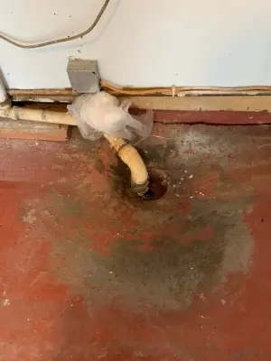 Single Vehicle Garage Floor Renovation — Stone & Concrete Installation project by RTP Concrete Coatings