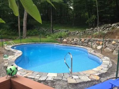 Swimming Pool Patio — Stone & Concrete Installation project by J & C Masonry & Landscaping, Inc.