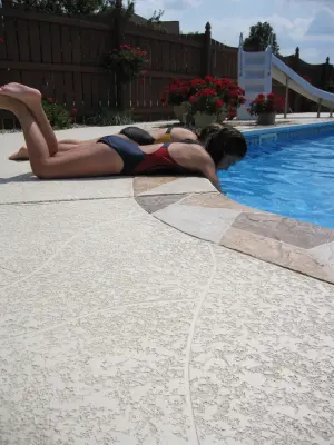 Sundek Classic Texture Pool Deck with Stamped Concrete Border by Decorative Concrete Resurfacing