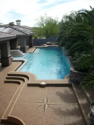 Swimming Area Patio — Stone & Concrete Installation project by Pebble Stone Coatings