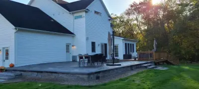 Elevated patio — Stone & Concrete Installation project by Legacy Masonry & Hardscaping