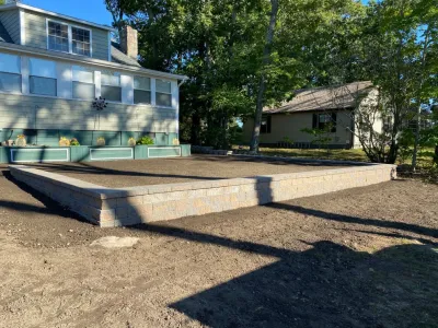 Retaining Wall Installation — Landscape Construction project by Tate's Property Care, LLC