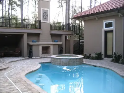 Poolside Patio — Stone & Concrete Installation project by Quality Concrete Contractors