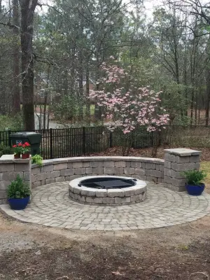 Camden, SC Outdoor Firepit and Seating Wall — Stone & Concrete Installation project by Tranquil Escapes LLC