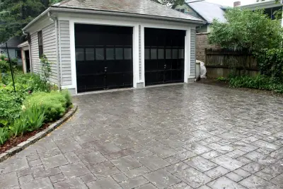 2013 Unilock Best Permeable Paver Driveway Award Winner - Jamaica Plain — Stone & Concrete Installation project by Premier Pavers & Hardscape Co