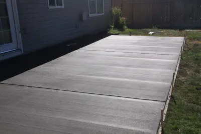 Colored Concrete for Back Patio — Stone & Concrete Installation project by RockHard Concrete