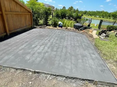Stamped Back Patio — Stone & Concrete Installation project by Flores Concrete