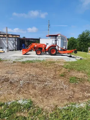 Barn and Parking Area by The Concrete Gentlemen, LLC