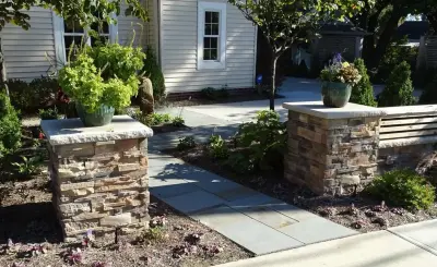 Bay Village Landscape Overhaul — Stone & Concrete Installation project by Land Creations Landscaping Inc.