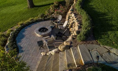 Lakeside Fire Pit and Retaining Wall Remodel by TERRAFIRMA Landscape