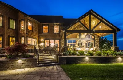 Luminous Gardens: Illuminating Your Landscape with Artful Lighting — Landscape Construction project by TERRAFIRMA Landscape in Ann Arbor