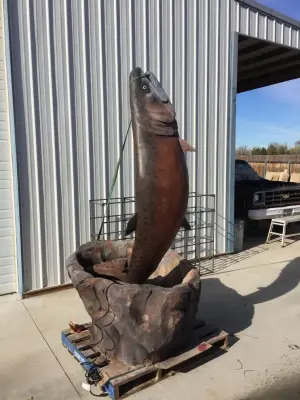 Engraved Salmon Water Feature — Stone & Concrete Installation project by Northwest Concrete & Landscape, LLC