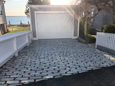 Paved Driveway with Drainage System by Hefel Masonry LLC