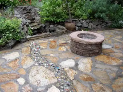 Personalized Outdoor Fire Pits — Stone & Concrete Installation project by CD Paver Management