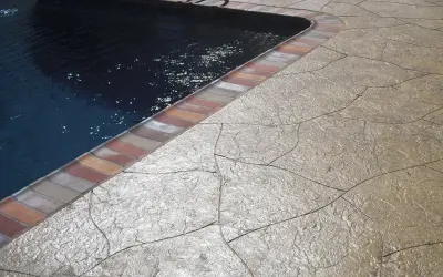 Innovative Pool Deck Design Concepts — Stone & Concrete Installation project by Concrete Coating Specialists, Inc. (San Diego)