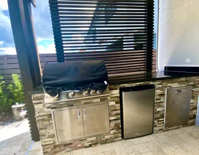 Miami Lakes Patio Upgrade — Landscape Construction project by The Garden District