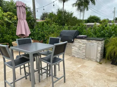 Valero's Amazing Patio and Edible Garden by The Garden District