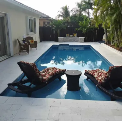 Robertson's New Pool Oasis — Landscape Construction project by The Garden District in Miami