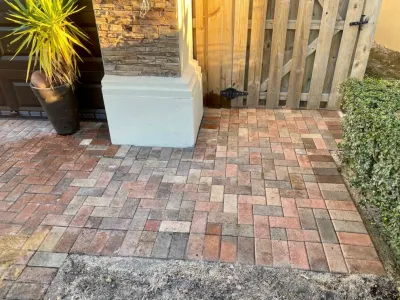 Paver driveway and walkway — Landscape Construction project by The Garden District in Miami
