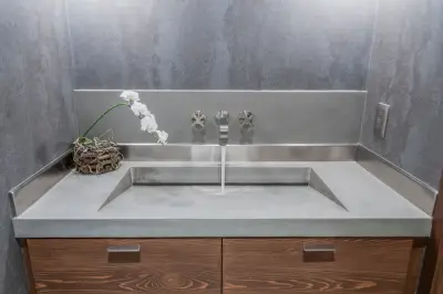 Bespoke Concrete Powder Room Countertop with Built-in Sink — Stone & Concrete Installation project by Thiel Studios