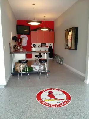 Cardinal Pride: Garage Flooring in St. Louis, MO — Stone & Concrete Installation project by Decorative Concrete Resurfacing