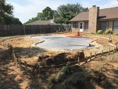 Stamped Concrete Pool Deck and Driveway Expansion by Crest Concrete