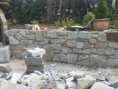 Dunwoody compact backyard — Stone & Concrete Installation project by PaverStone Construction And Greenmark Landscaping