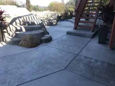 El Cajon Swimming Pool with Waterslide — Stone & Concrete Installation project by United Concrete