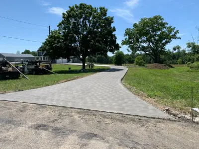 Outstanding Driveway — Stone & Concrete Installation project by Paris Brothers & Company, Inc