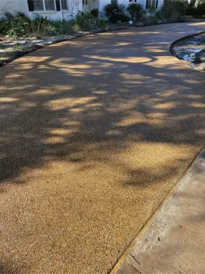 Decorative Gravel Driveway — Stone & Concrete Installation project by Crest Concrete
