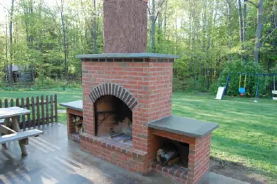Fireplaces, Wood-Fired Ovens, and Brick Heaters — Stone & Concrete Installation project by Miller And Richard Masonry
