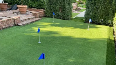 PUTTING GREEN WITH ARTIFICIAL TURF by The Landscaping People, Inc.
