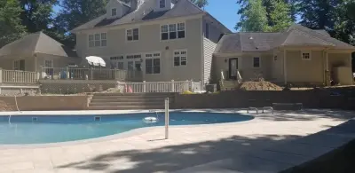 Aquatic Monarch Pool — Stone & Concrete Installation project by Legacy Brick & Stone