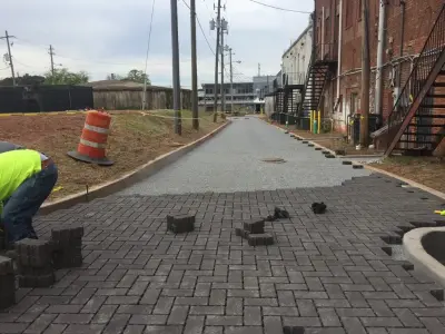 Harvard Alley Permeable Paving Streetscape Initiative in College Park, GA — Stone & Concrete Installation project by PaverStone Construction And Greenmark Landscaping
