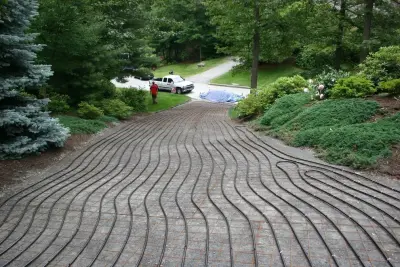 Winchester, MA Heated Paver Driveway — Stone & Concrete Installation project by Premier Pavers & Hardscape Co