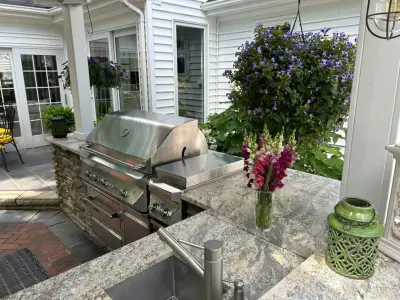 Hudson Backyard Oasis with Pool — Stone & Concrete Installation project by Land Creations Landscaping Inc.