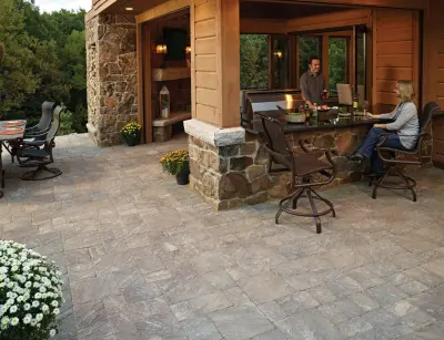 Outdoor Oasis: Patio, Kitchen, and Living Space — Stone & Concrete Installation project by Anchor Block Company
