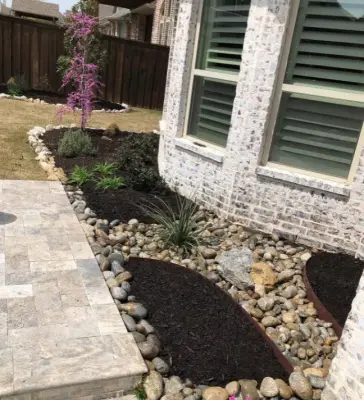 Paved Front Landscape — Stone & Concrete Installation project by New Horizon Design & Build
